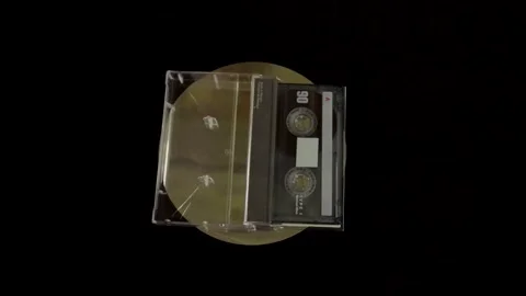 Top-down view of a vintage audio tape rotating on a platform. Stock Footage 327624869