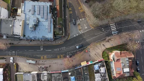 Top down view of Wanstead t-junction with traffic and road markings Stock Footage 327721252