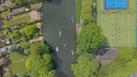 Top-Down View of Warwick with Avon River, Canoe, Tennis Courts, and Suburban 스톡 동영상 331202128