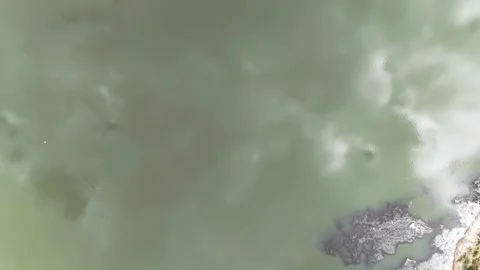 Top to down view to water of lake Stock Footage 284621359