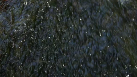 Top down view waterfall close up edge cascading into pool slow motion 動画素材 86888336