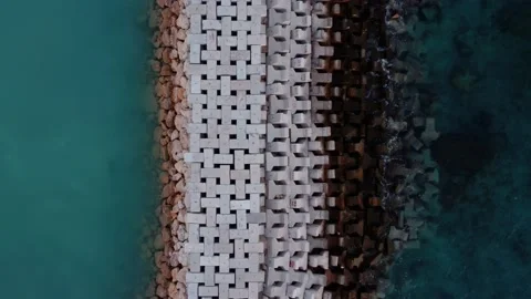 Top down view on wave breaker on balinese beach Stock Footage 165623730