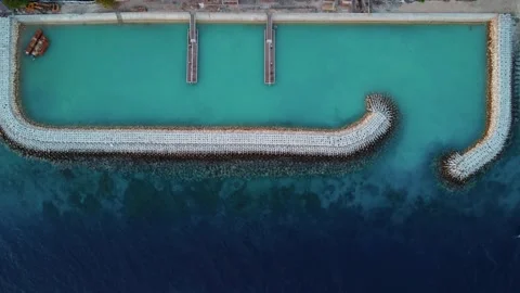 Top down view on wave breaker on balinese beach Stock Footage 165773952