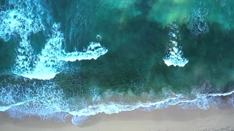 Top-Down View of Waves Rolling Gently Onto a Sandy Beach in the Caribbean. Stock Footage 274827422