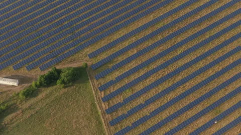 Top Down View Of A White Storage Battery And Diagonal Photovoltaic Rows Ove.. Stock Footage 338995293
