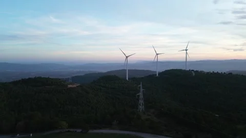 Top-down view of wind turbines on mountains with natural scenery Stock Footage 327274296