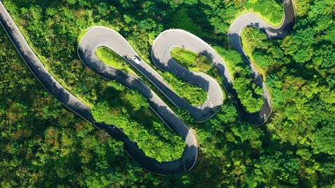 Top down view of winding road in forest Stock Footage 146629365