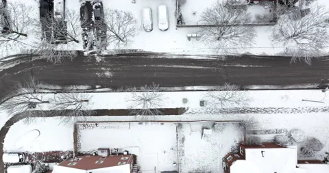 Top down view of winter streets in canadian neighourhood after snow Stock Footage 167854285