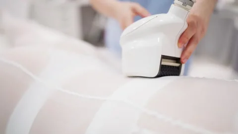 Top-down view of woman lying on treatment table during professional body co.. Stock Footage 342162064