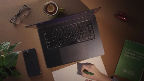 Top-down view of a woman typing on a modern laptop Stock Footage 296331986
