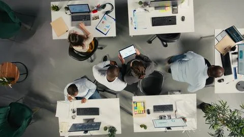 Top down view of work team in multinational company Stock Photos