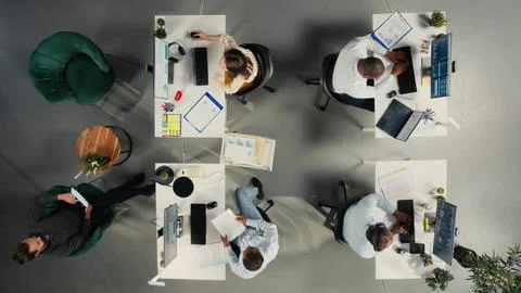 Top down view of workers in multinational company discuss business strategy Stock Photos