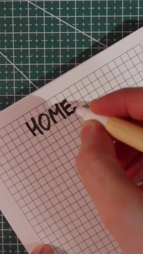 Top down view of writing Homework in notebook with marker Stock Footage 341246041