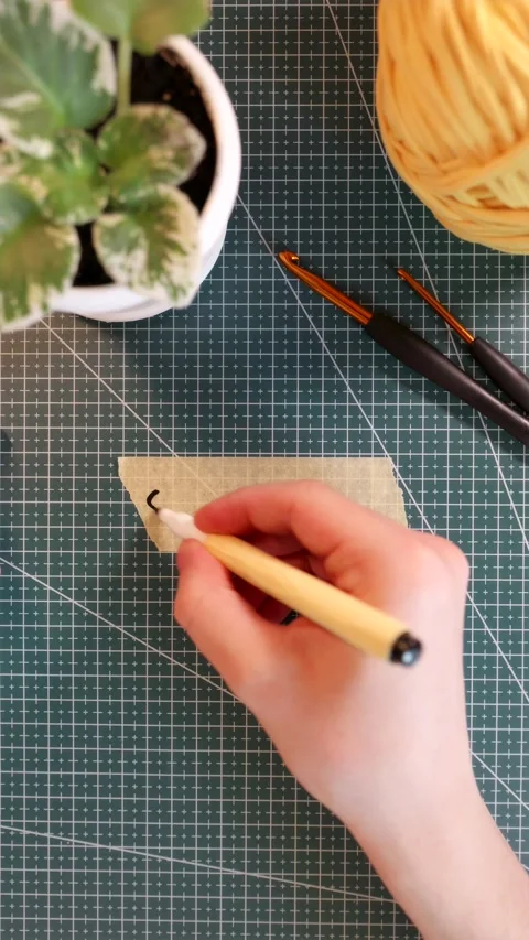 Top down view of writing STRESS RELIEF on masking tape with cozy accessories Video stock 338183617