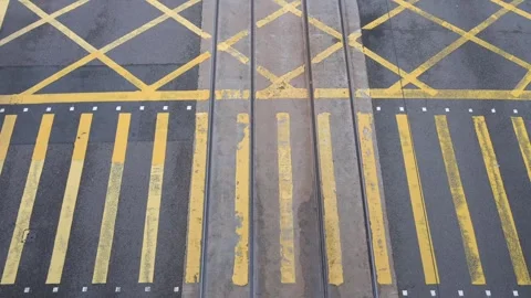 Top-Down View of Yellow Zebra Crossing at Intersection in Hong Kong, Urban 動画素材 294661615