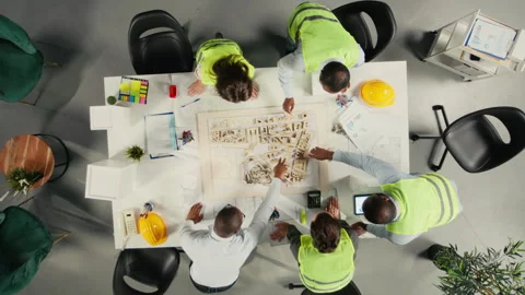 Top down view zoom in of real estate professionals using architectural software Stock Footage 320031728