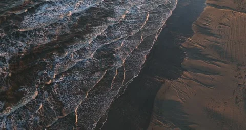 Top Down Waves and Sand on the Beach Drone Aerial View Galveston Texas USA 動画素材 335766192