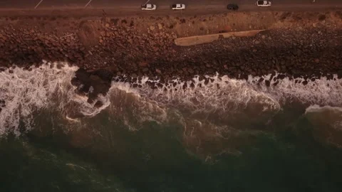 Top-Down Waves Breaking Beside Pacific Coast Highway Stock Footage 346671154