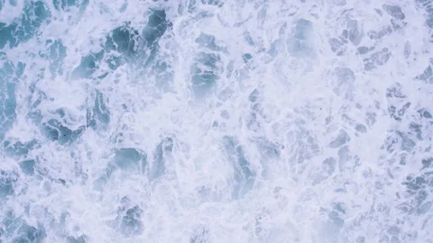 Top down waves splash to foaming background Stock Footage 217360551