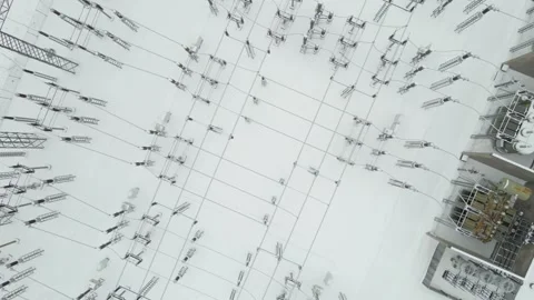 Top Down Winter View of High Voltage Substation With Transformers and Grid Stock Footage 328816153