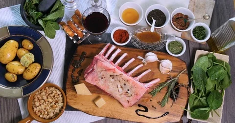Top down zoom in view of ingredients for minted rack of lamb Stock Footage 73485043