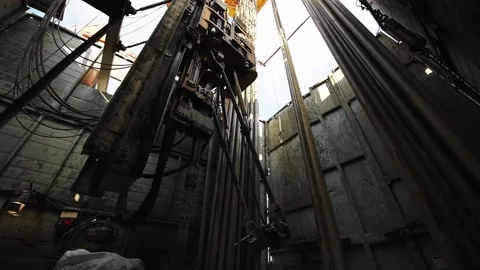 Top Drive System TDS and Derrick of Oil Drilling Rig Stock Footage 151292766