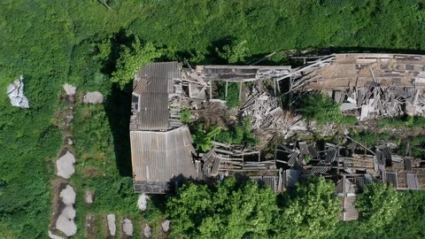 Top drone flight over destroyed farm Stock Footage 111731104