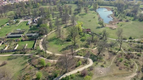 Top drone footage of Flatow Tower in Babelsberg Park at Potsdam, Germany Stock Footage 285848714