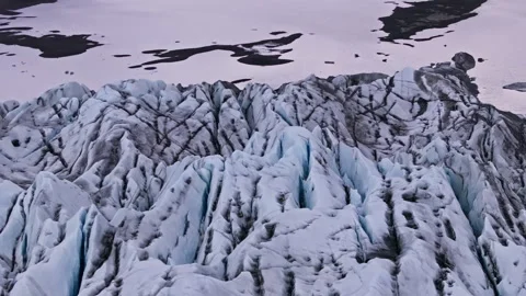 Top drone view of cracked rugged Hoffellsjökull glacier ice field in Iceland Stock Footage 340257314