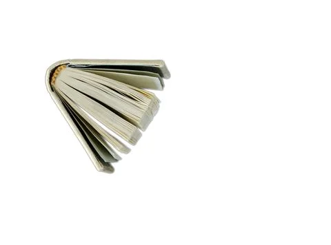 Top Edge View of an Open Miniature Book Isolated on White Background Stock Photos