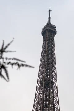 The top of the Eiffel Tower against a winter sky in Paris 写真素材