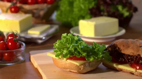 Top Of Freshly Made Bread Rolls Falling Onto Sandwiches Stock Footage 62429643