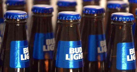 Top front view of rotating Bud Light Beer bottles. Stock Footage 141295354