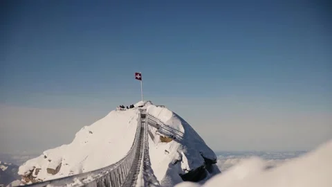 On the top of Glacier 3000 there is a Peak Walk is a pedestrian bridge Stock Footage 226403958