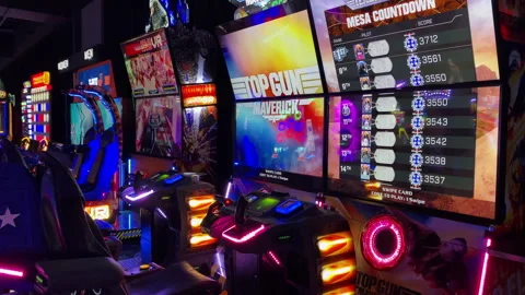 Top Gun Maverick flight simulator arcade machines with screens and reali Dave-29 Stock Footage 339533555