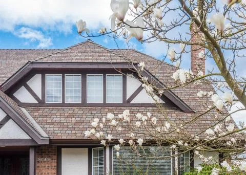 The top of the house with nice window. Stock Photos
