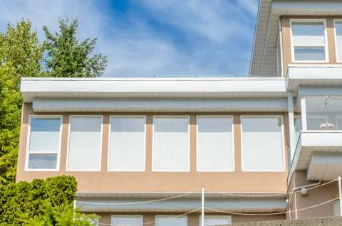 The top of the house with nice window. Stock Photos