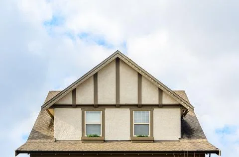 The top of the house with nice window. Stock Photos