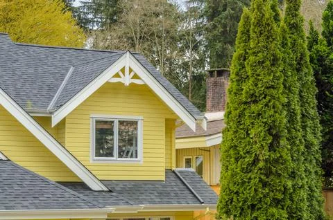 The top of the house with nice window. Stock Photos
