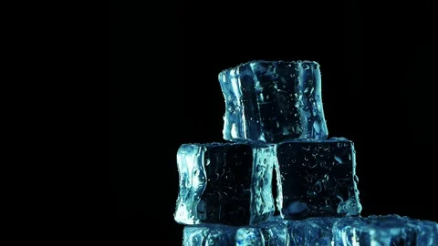 Top iced cube with water drop rotation Stock Footage 107805145