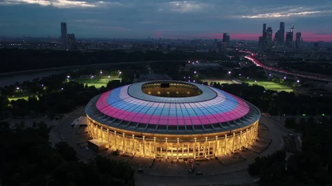 Top illumination of the Flag Luzhniki stadium Moscow at sunset.Aerial 4k Stock Footage 104300341