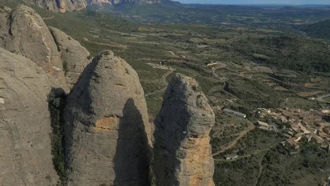 The top of large rock formation next to Spanish town of Aguero Stock Footage 102514193