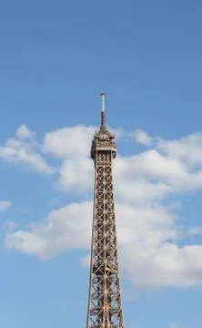 Top level of Eiffel Tower in Paris and blue sky Stock Photos