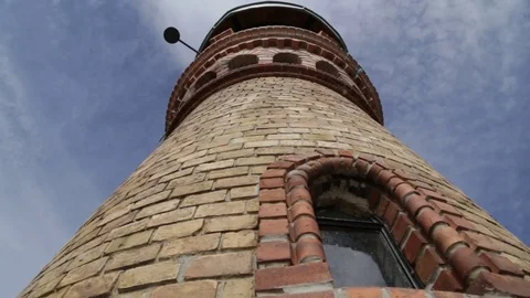 Top of the lighthouse against blue sky Vídeo Stock 81325948