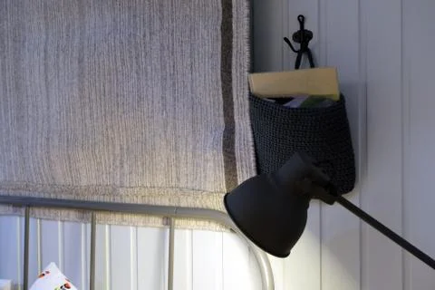 Top lights, bedside chest. A bedside rug. Bed soft blanket pillows. The Stock-Fotos
