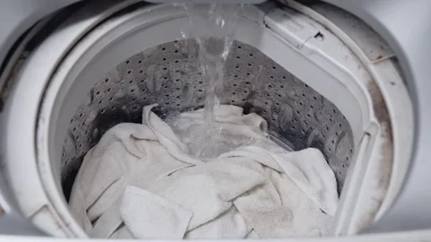 Top-loading washing machine filling with water 스톡 동영상 331556411
