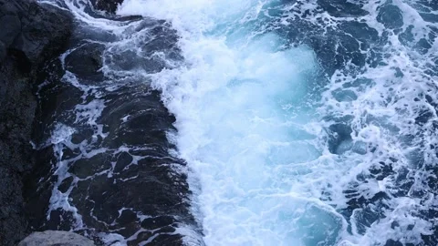 Top looking down of surf waves rolling over a reef with white water break. Stock Footage 201083279