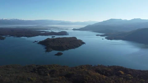 Top of the mountain with a beautiful view, hugging and rejoicing together. View Stock Footage 229906969