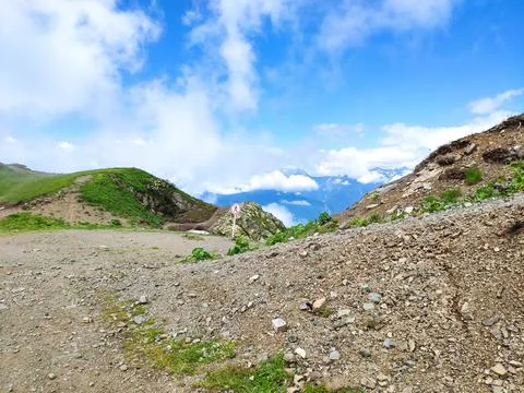 On top of a mountain in the clouds in summer 写真素材