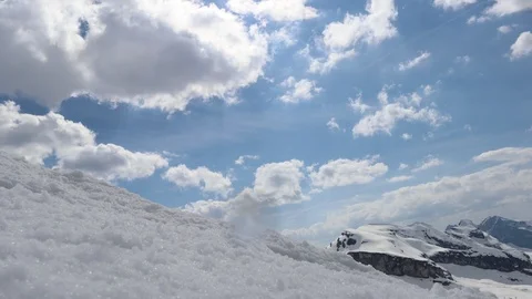 Top of mountain, clouds timelapse, snow, sunny day 動画素材 101308947